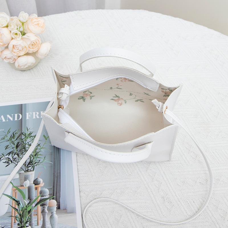 Flower embroidered handbag, stylish and simple shoulder bag, lightweight and compact mobile phone bag, women's bag.