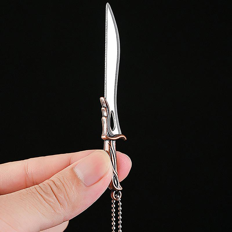 Брелок портативный мини-нож подходит для открытия праздничных подарков — фото 2