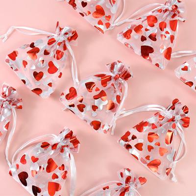 Ambalaj pentru cadouri
 – Saci de ambalare și organza