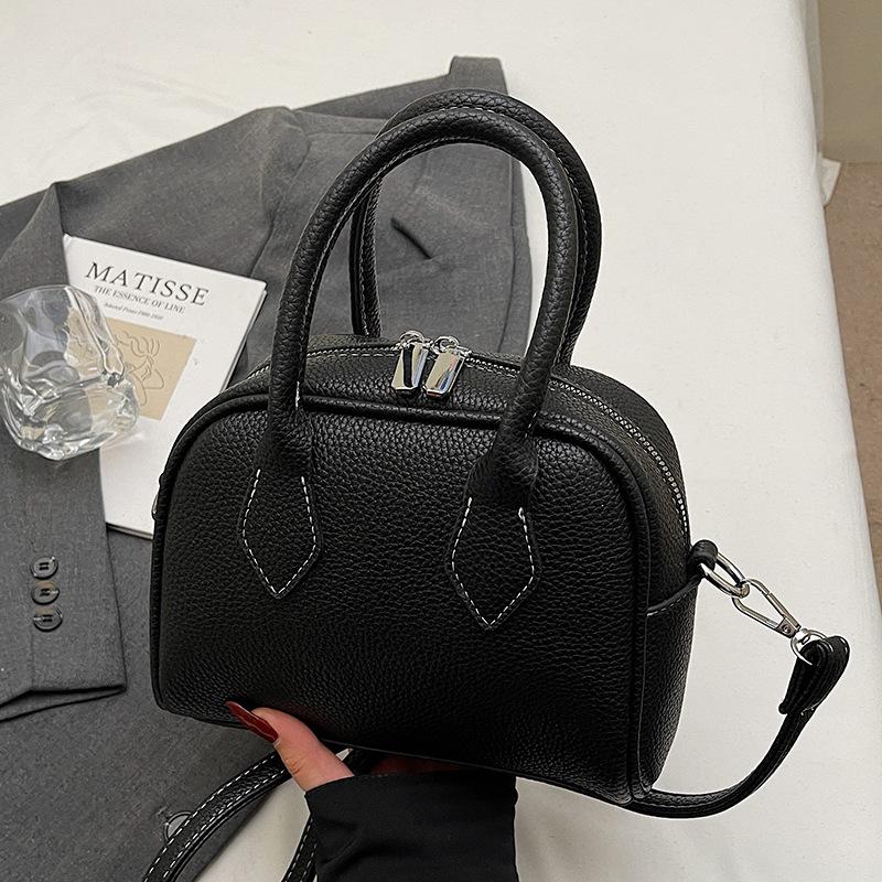 

Оптовая горячая распродажа корейская версия простой текстуры с узором личи портативная сумка-подушка женская повседневная сумка-мессенджер с темпераментом