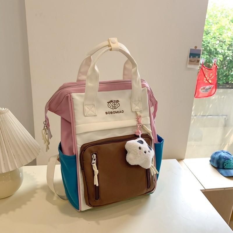 

Stylish Unisex Retro Backpack With Cute Star Pendant For School And Travel BrownCute Stars