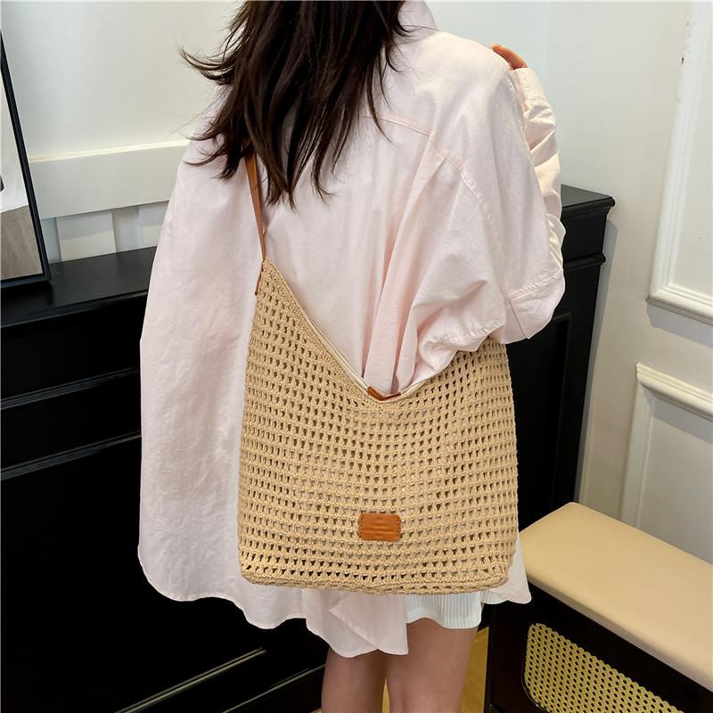 Summer large-capacity underarm bag women's 2025 new hollow woven bag simple shoulder crossbody bucket bag