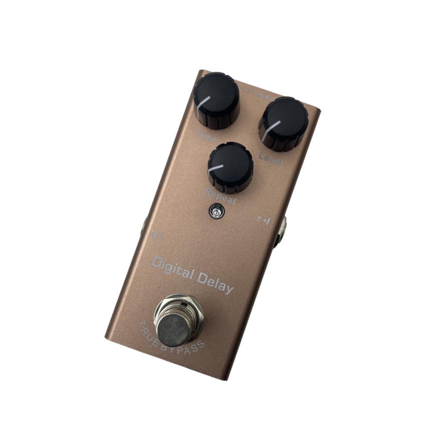 Compact Professional Electric Guitar Effects Pedal with 10 Effects: Distortion, Delay, Chorus, Vibrato, and Sound Simulator.