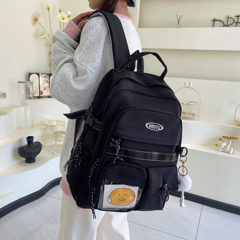 Junior and high school large-capacity class schoolbag female solid color simple leisure travel backpack fashionable canvas versatile backpack