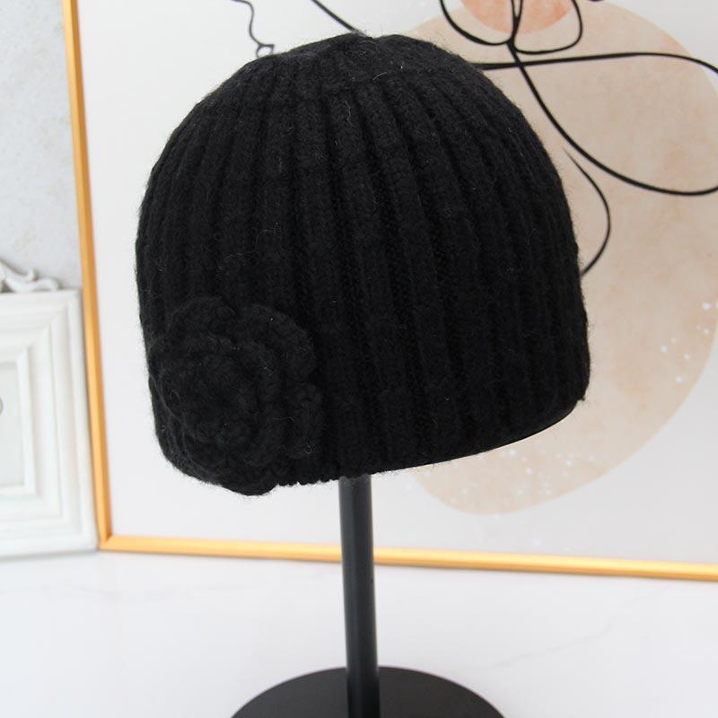 Three-dimensional flower knitted headgear women's autumn and winter face small warm windproof cold hat ear protector wool hat pullover hat