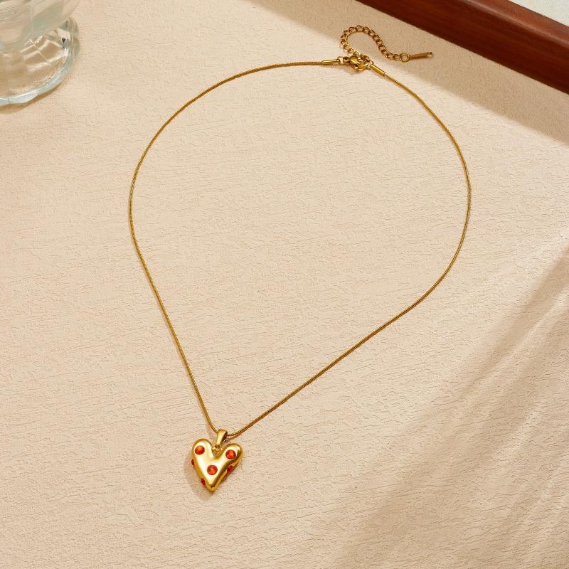 

Gold Snake Bone Chain Necklace with Red Crystal Heart Pendant for Women золотой