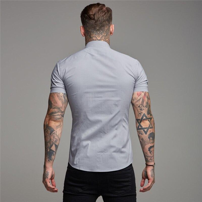 Muscleguys Letní jednobarevná košile Pánská košile s krátkým rukávem Hongkongský styl Univerzální pohledný top v korejském stylu s klopou Trend