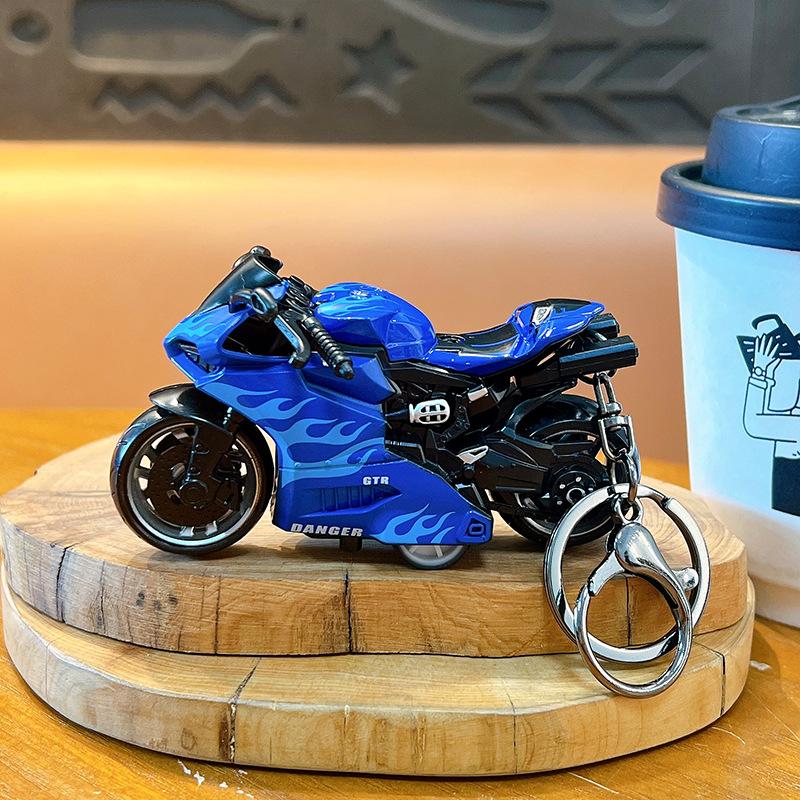 

Inertial Fire Dragon Motorcycle Keychain Pendant Toy