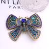 SKEDS Französische Schwere Handwerkskunst Schmetterlingsbrosche Damen Luxus Strass-Insekten-Anstecker Persönlichkeit Eleganter Schmuck Klassischer Schmuck