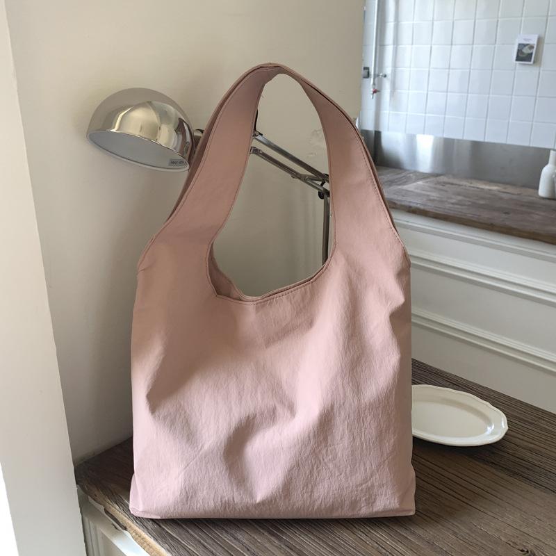 Retro casual commuter tote bag women's 2026 spring new texture niche simple shoulder armpit bag