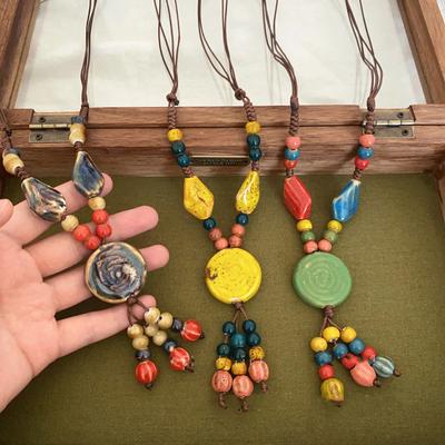 JMXD Keramik Bunte Runde Perlen Quaste Halskette Neuer Chinesischer Vintage Stil Dopamin Süß Einzigartig Vielseitig Schlüsselbein Kette Strand Bohemian