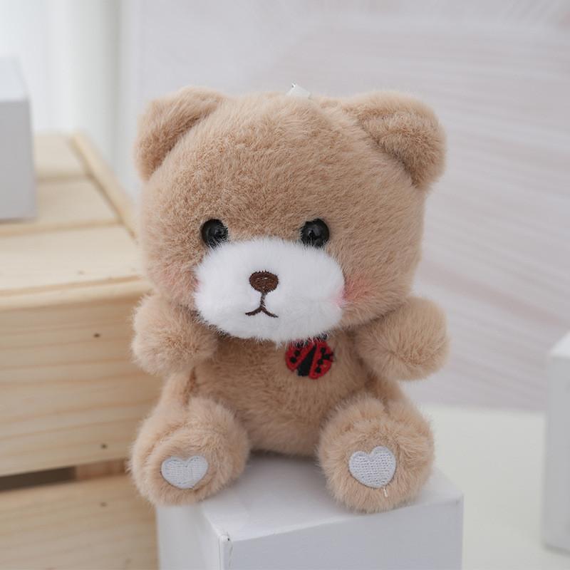 

Charming Miniature Bear Plush Toy With Soft Fur Perfect For Bags And Keychains