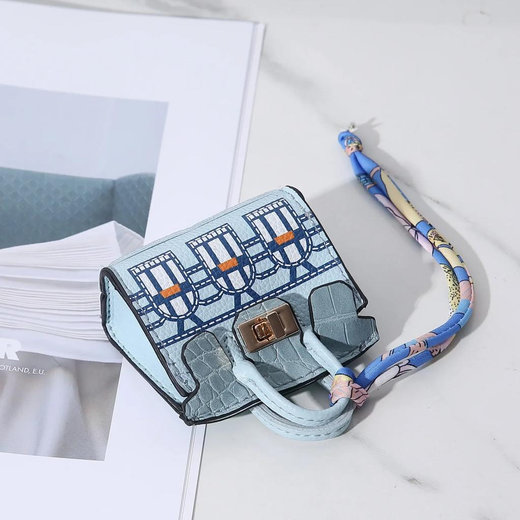 Neue kleine Mini-Haustasche, Handheld, tragbar, Handseil, Bluetooth-Kopfhörertasche, Zero Wallet, multifunktionale kleine Tasche