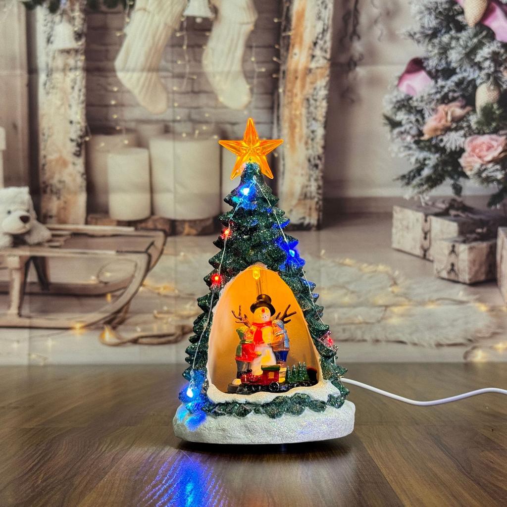 Juldekorationer, glödande musik, julgransbordsdekorationer, snöhusspeldosor, julklappar