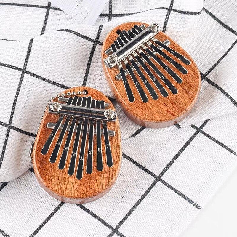 1Pcs Wood Mini Thumb Piano Musical Playthi High Quality Durable Design Safe for Children ngs 8 Tones Portable Beginner Finger Piano