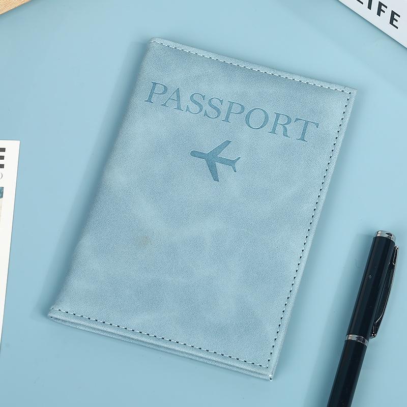 

New Passport Cover: Custom Multi-Color, Multi-Functional, with Multiple Card Slots, Leather Feel, and Anti-Theft Features. Passport Bag світло-синій колір