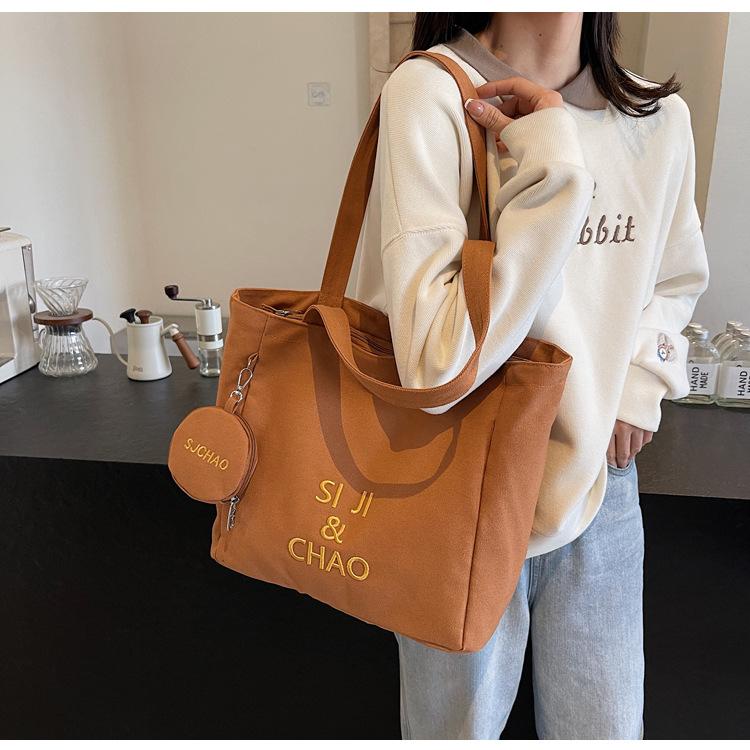 Women's Large-capacity Canvas Bag, Simple Letters, Versatile Commuting Artifact.