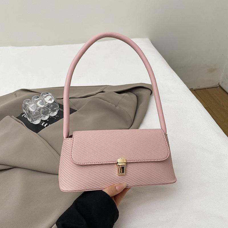 

Solid color retro design foreign style lock fashion 2025 new solid color one shoulder crossbody armpit small square bag women розовый