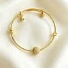 Elegant open bangles with various beaded decorations and bells are suitable for women to wear on various occasions such as weddings, banquets, and