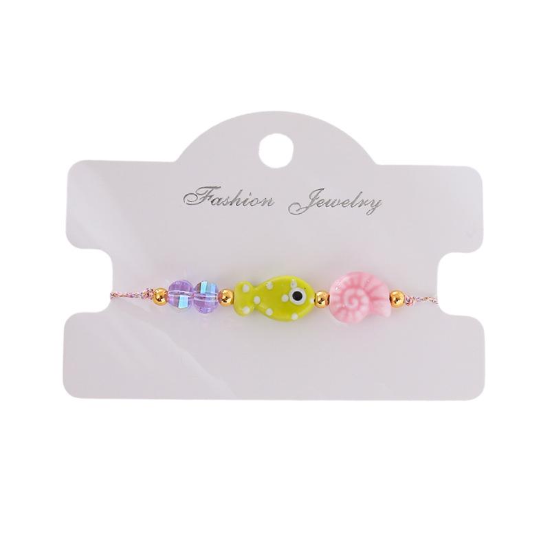 Bohemian Handmade Braided Rope Bracelet with Small Fish and Conch Charms