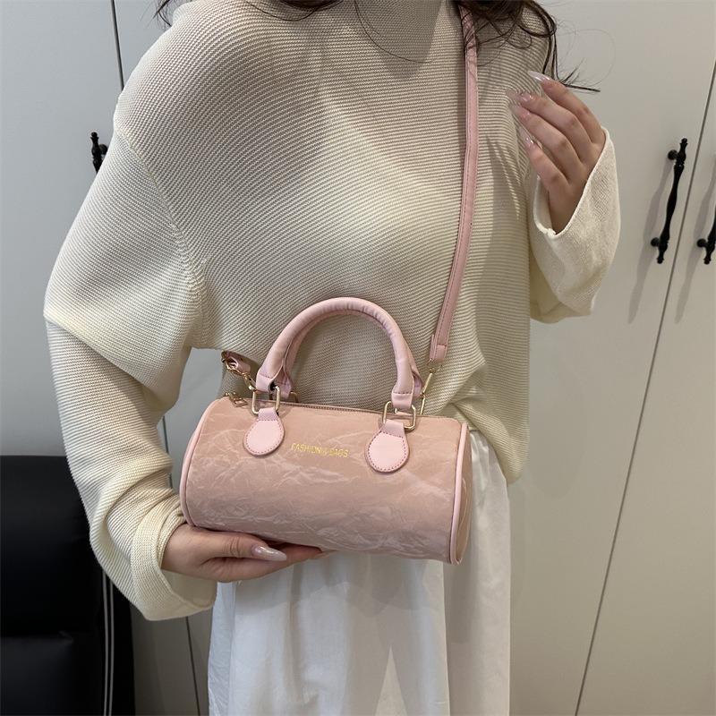 Niche design cylinder handbag new temperament versatile high sense messenger bag fresh and sweet shoulder bag