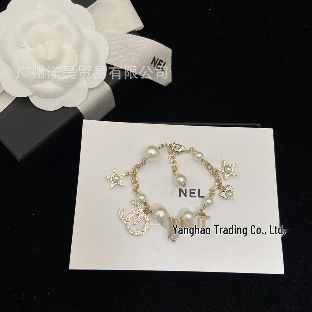 Seiko Elegantes Doppel C Perlen- & Diamant-Sternenherz-Armband für Damen