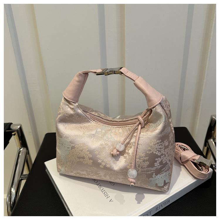 

2024 Женская летняя сумка кроссбоди с вышивкой в национальном стиле - Древняя и шикарная сумка-ведро розовый