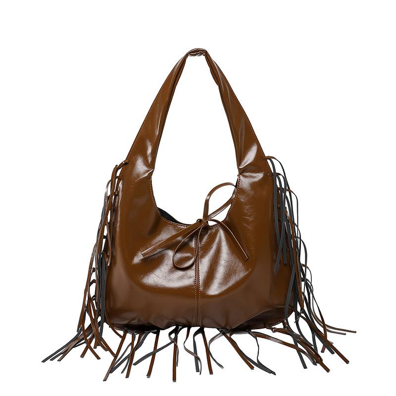 

European and American high-end underarm bag women s 2025 summer new niche design fringed shoulder bag fashionable tote bag