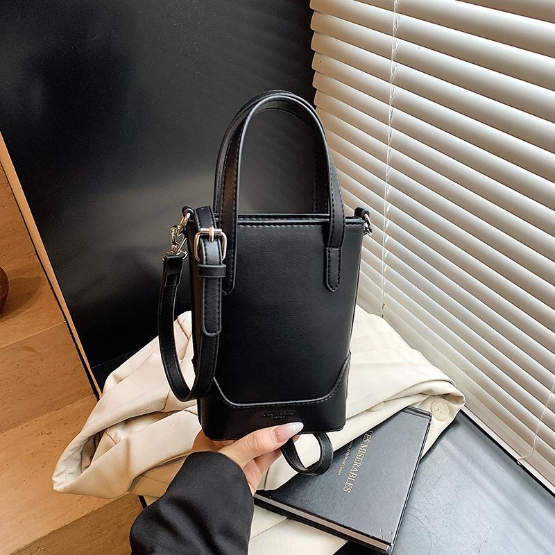 

Niche hand carrying bucket bag women s new high-end fashion shoulder messenger bag mobile phone bag