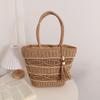 IELGY fashion hollow shoulder straw bag, fringed hand-woven holiday wind beach women's bag