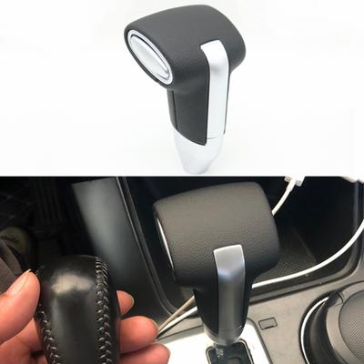 Knoflík pro automatickou úpravu rukojeti řadicí páky pro Kia Sorento 2009-2012 Borrego Mohave 2008-2016