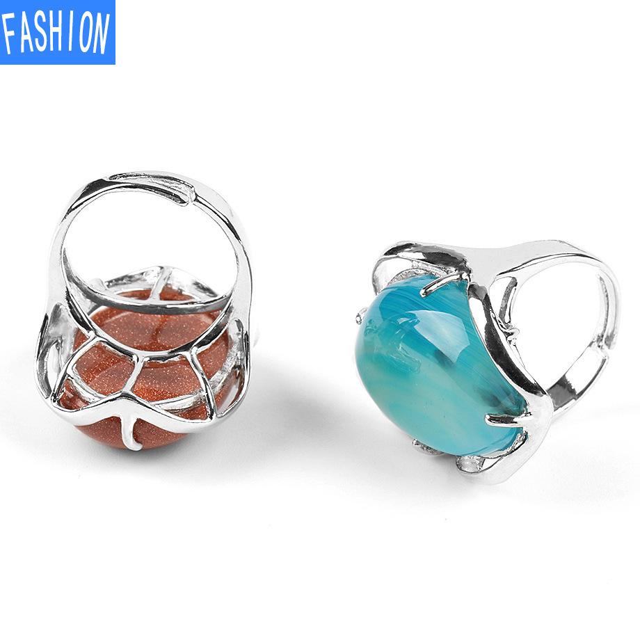 Natürlicher ovaler Kristallring mit vier Krallen