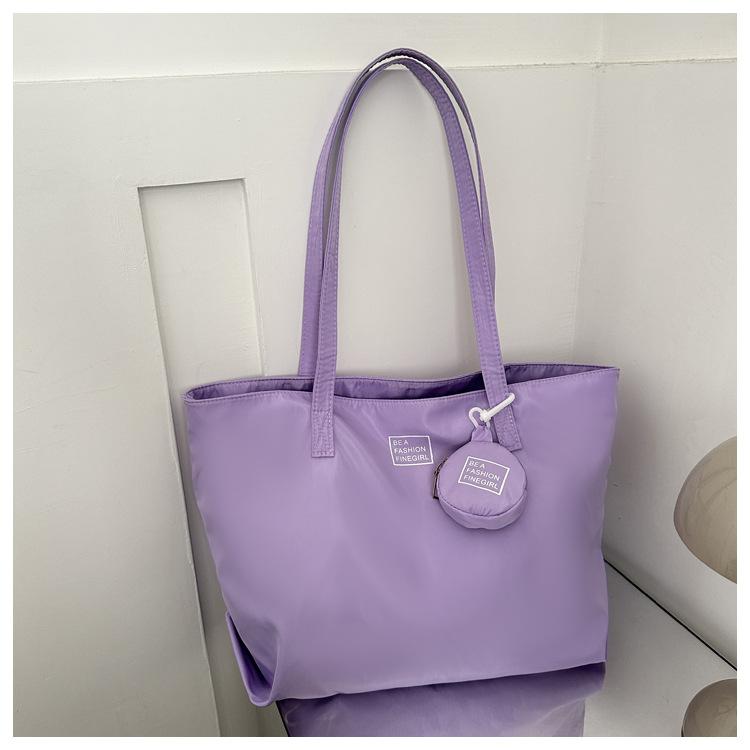 

2025 Новый тренд Большая вместимость Модная повседневная Однотонная Маленькая сумка-подвеска Оксфордская сумка на плечо с застежкой-кнопкой фиолетовый