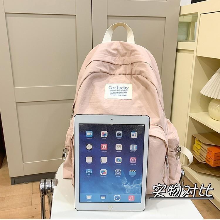 Schoolbag new Korean version large-capacity backpack female sweet and cute primary and secondary school schoolbag solid color simple travel backpack