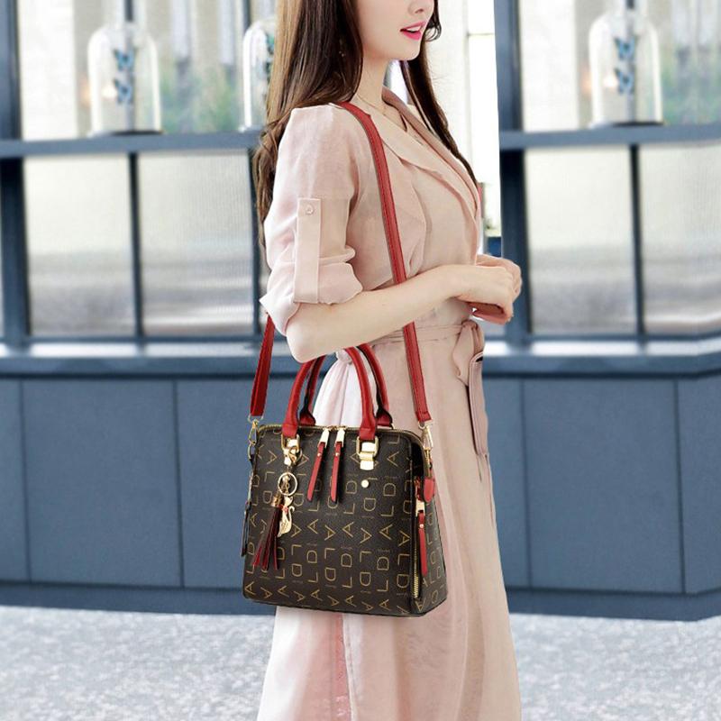 Stylish Womens Pu Leather Tote with Tassel Accent Top Handle and Shoulder Strap