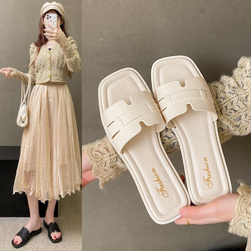 

Xiaoxiangfeng outer wear flat-bottomed women s slippers summer style casual versatile beach soft-bottomed non-slip thin women s slippers 40-41 [one size smaller] чорний