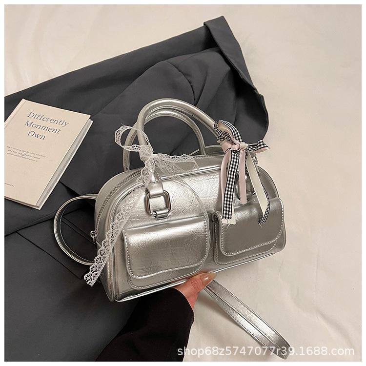 Versatile Korean version ins fashionable new portable Boston bag foreign style solid color oily skin niche simple messenger women's bag