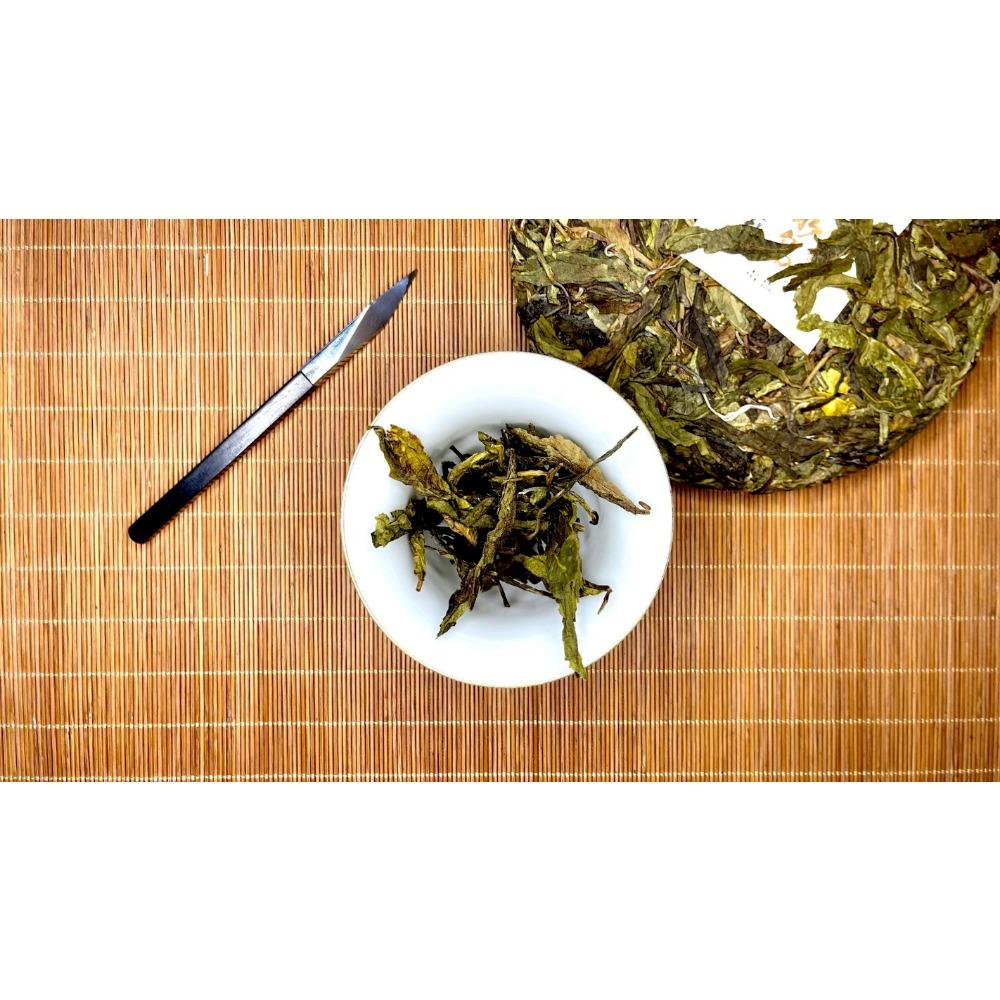 357g Yunnan Pu'er Teekuchen sieben Samen Kuchentee Island Blattgold reiner roher Tee