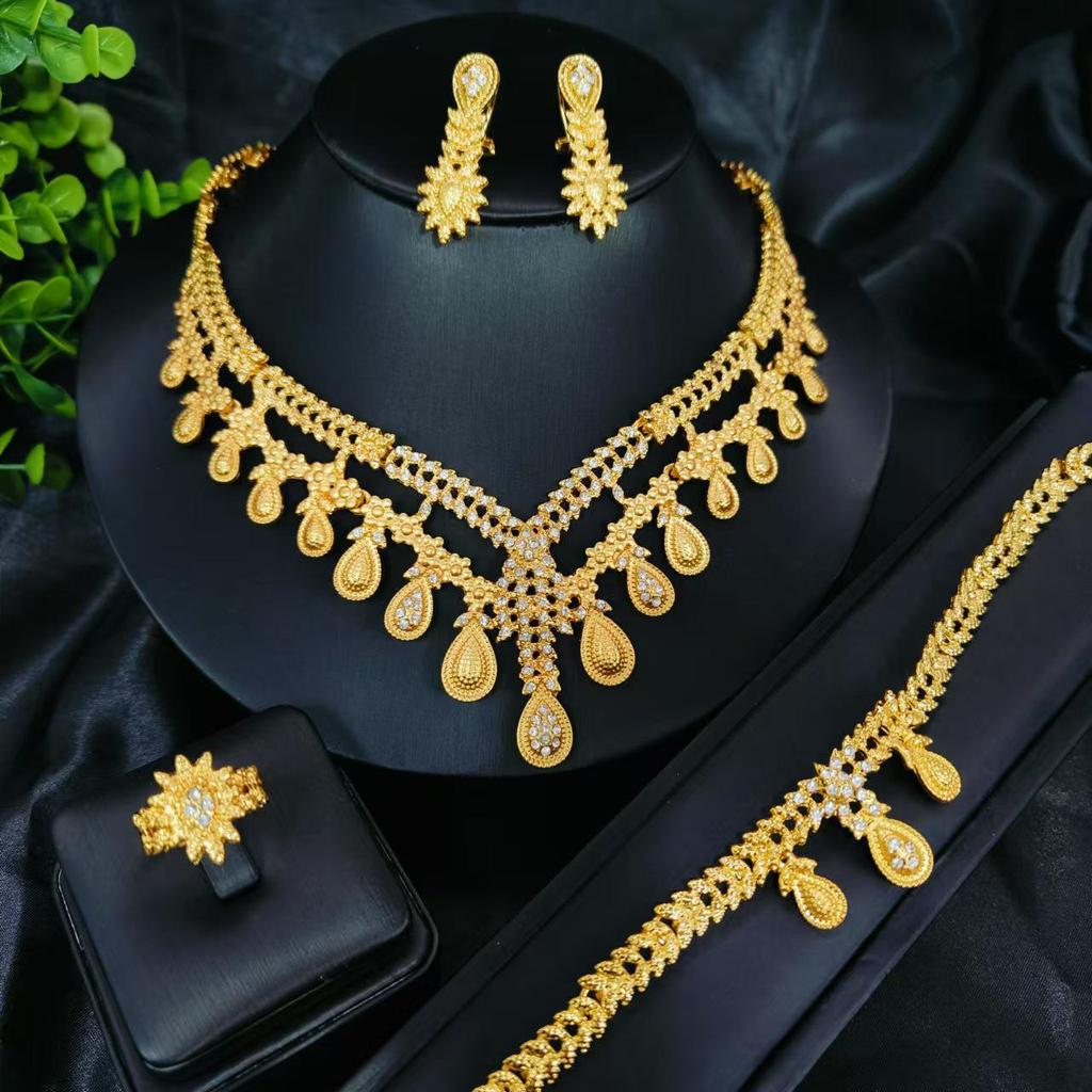24K Gold-Plated Bridal Jewelry Set: Necklace, Earrings, Ring & Bracelet for Middle Eastern, Indian, and Nigerian Weddings.