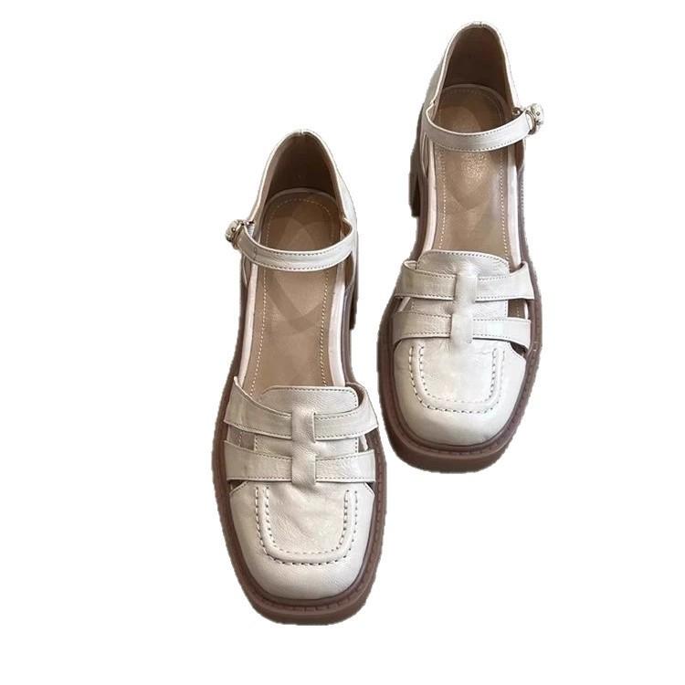 Retro woven hollow bag head Roman sandals women's soft sheepskin one-word buckle strap non-grinding feet soft sole high-heeled pig cage shoes