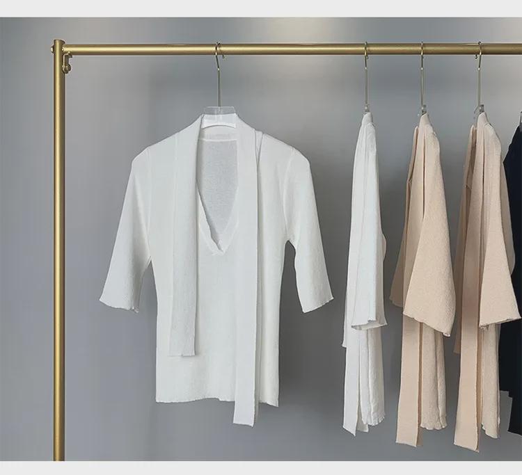 Koreanischer Dongdaemun Slim Fit Strickpullover mit halblangen Ärmeln und Schleifendesign für Damen