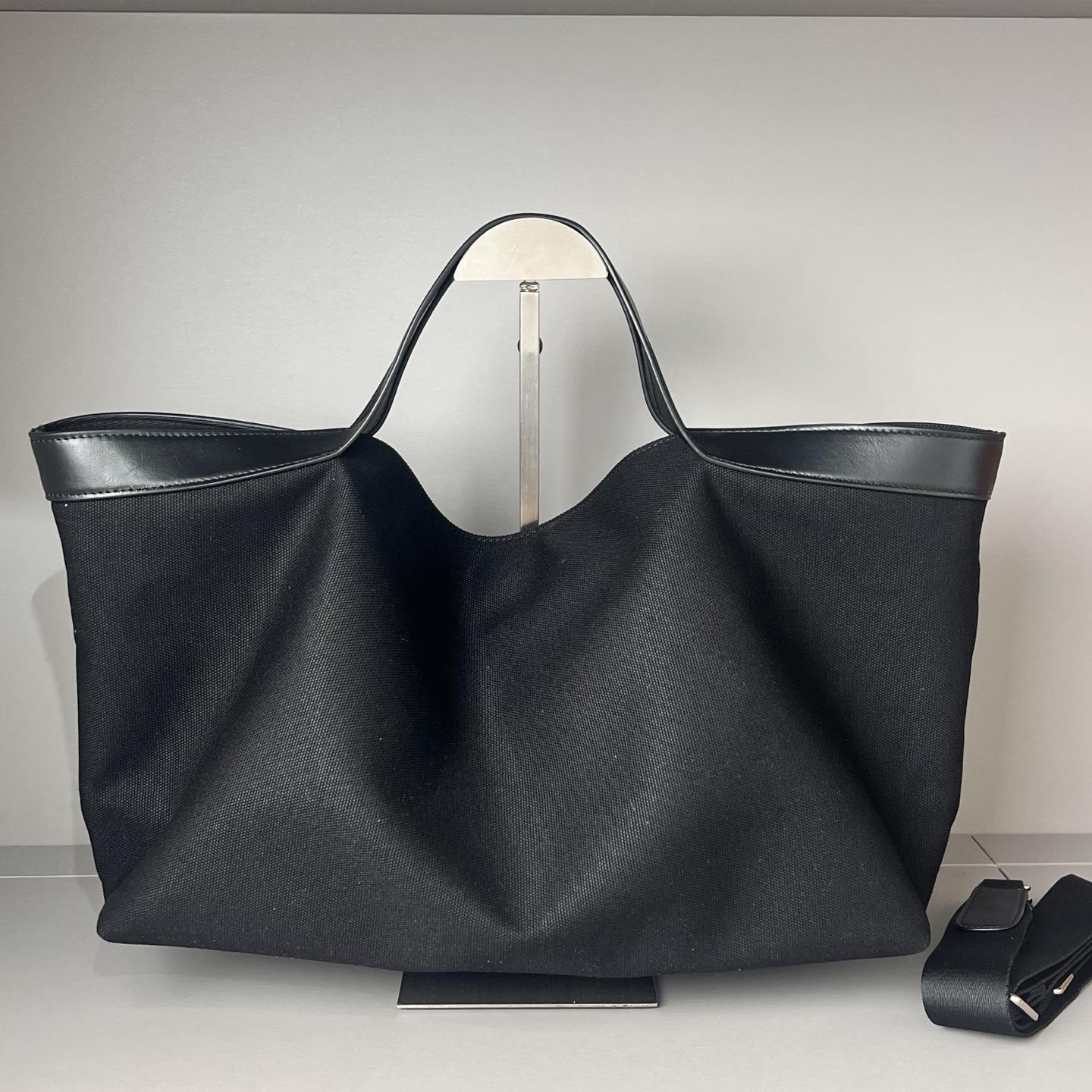 

Minority Design New Style Large Capacity Timeless Hundred-Piece Stitching Black Cowhide Connection Design Versatile Handheld Clutch Bag 36x13x25cm чорний