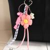Original Fashion Woven Flower Candy Flocking Puppy Bag Pendant Pendant Mobile Phone Lanyard Bag Hanging Accessories