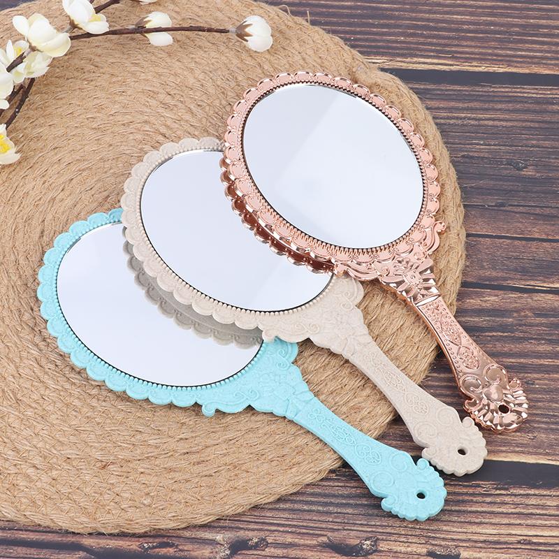 מראה איפור ידנית מגולפת וינטג' מראה ידנית עם ידית קוסמטיקה