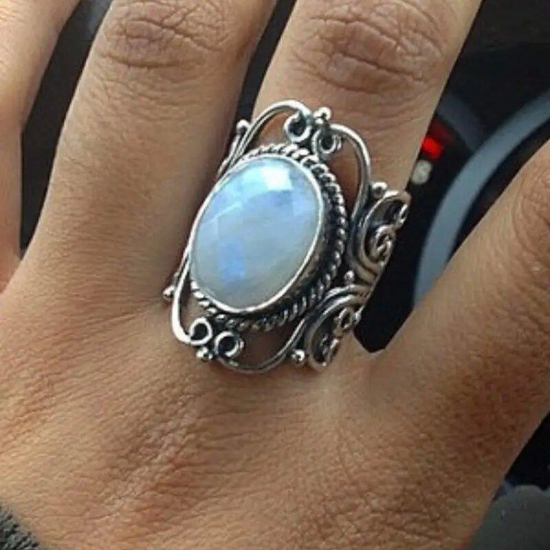 Retro inlaid imitation moonstone ring, hot-selling women's ring in Europe and America, geometric hollow engraved retro ring