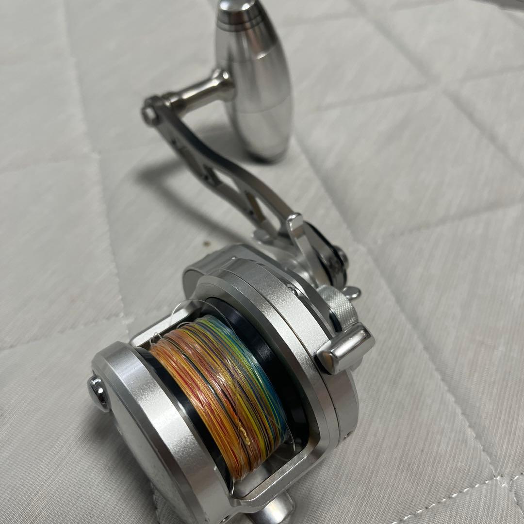 Used Bait reel main body silver