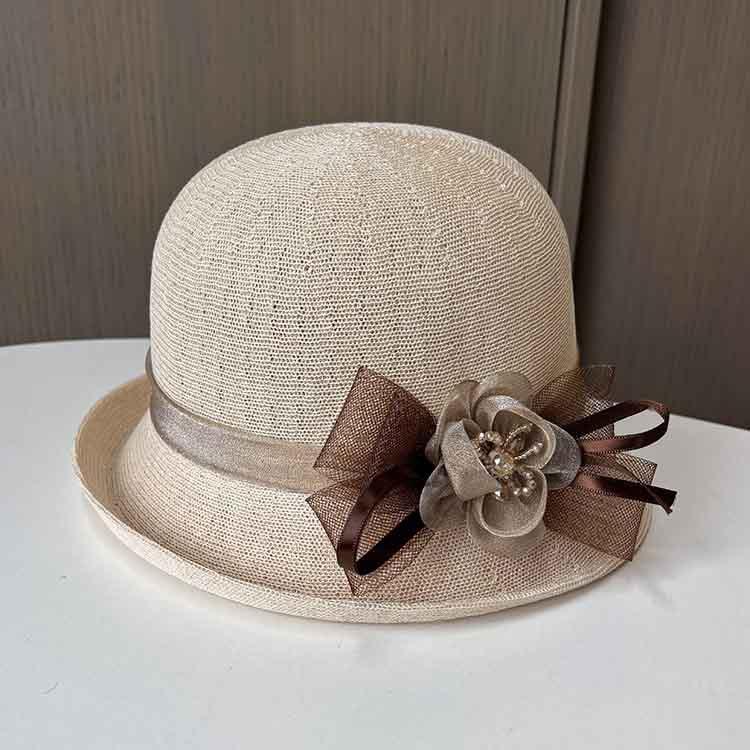Summer new flower knitted basin hat women's face small curling edge fashion sun hat French sunscreen top hat