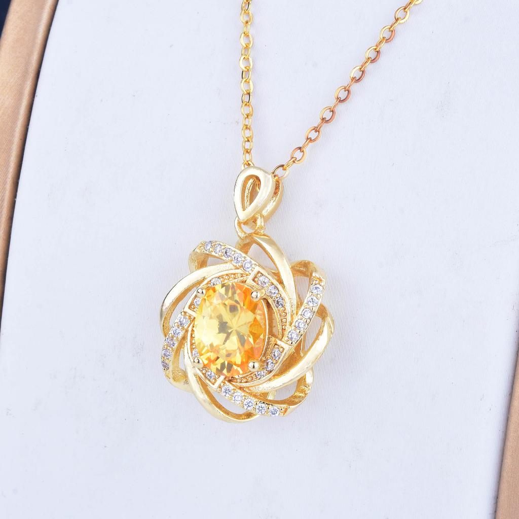 European and American atmospheric imitation yellow crystal pendant creative rotating windmill pendant inlaid with 18K gold inlai
