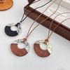 Minimalistischer Kaltwind-Spleiß-Halbpack-Ring-Anhänger Schwarzes Seil Lange Halskette Damen-Nische High-End Pulloverketten-Accessoires