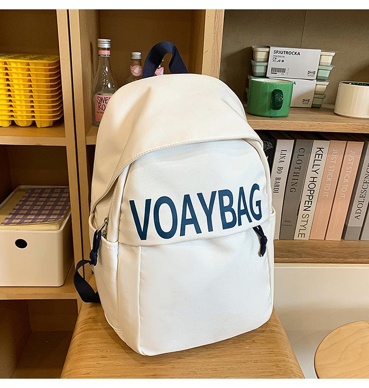 

New small fresh middle school student backpack female college high school student large capacity niche schoolbag fashion білий